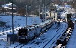 A few passengers on #20(2) mill about on the platform at Lynchburg